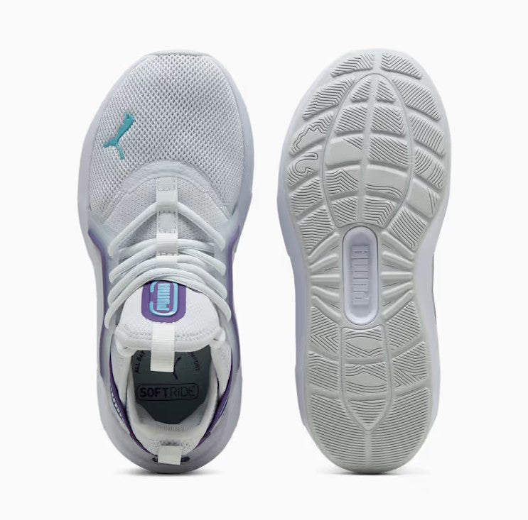 White Puma athletic shoe with purple accents on a white background