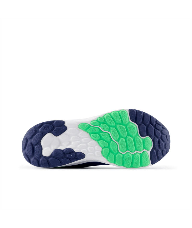 Close-up of a shoe sole with green and blue design on a white background