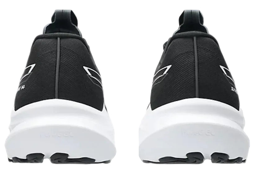 Black athletic shoes with white soles on a light gray background