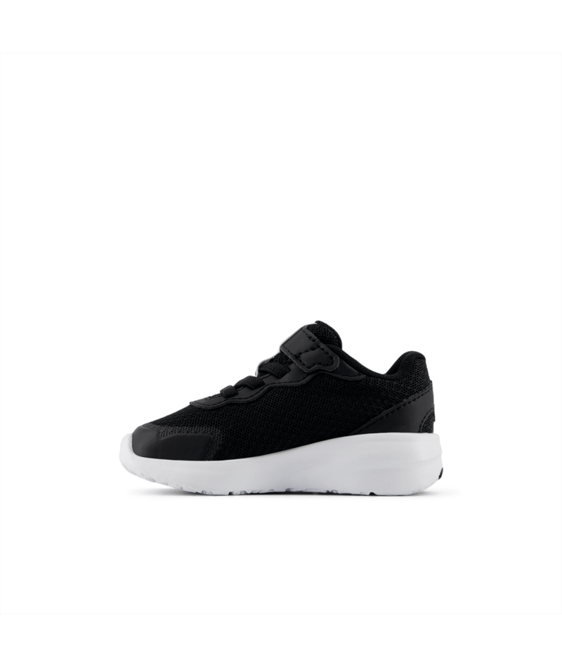 Black sneaker with white sole on a white background