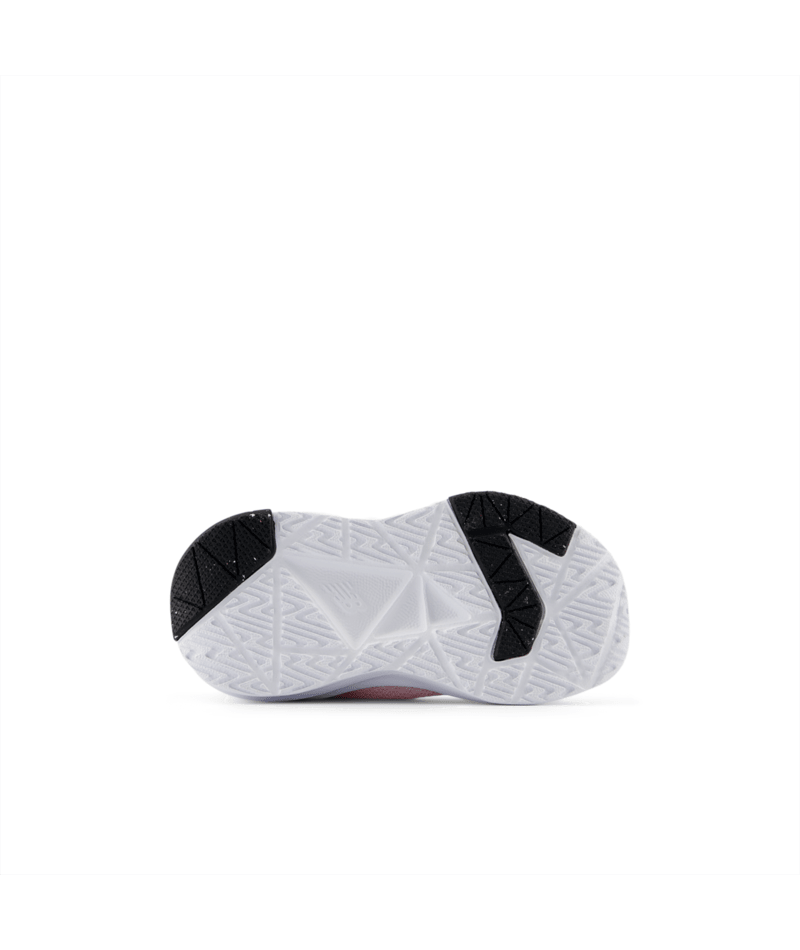 White toddler shoe sole with black accents on a white background