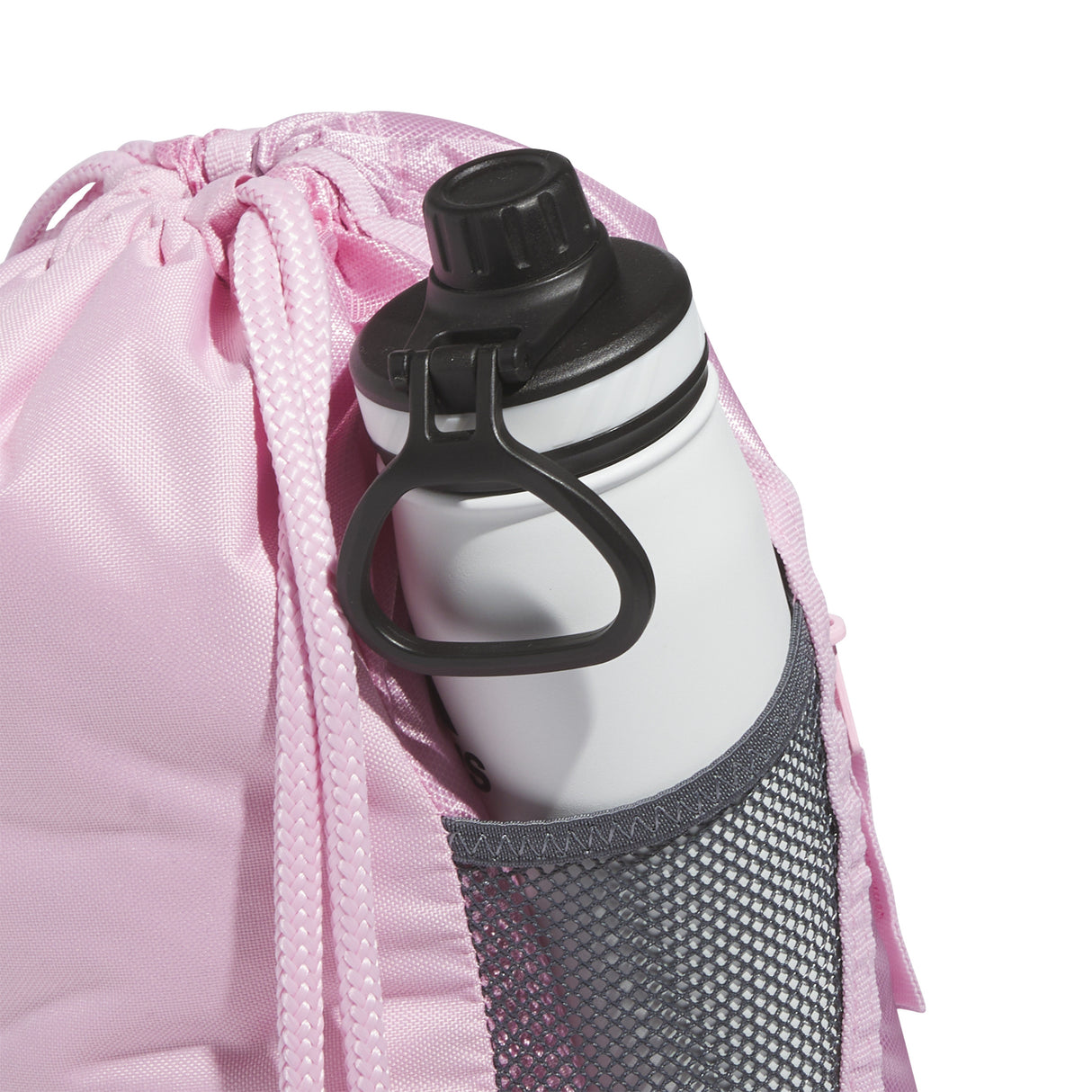 White water bottle with black cap inside a pink drawstring bag