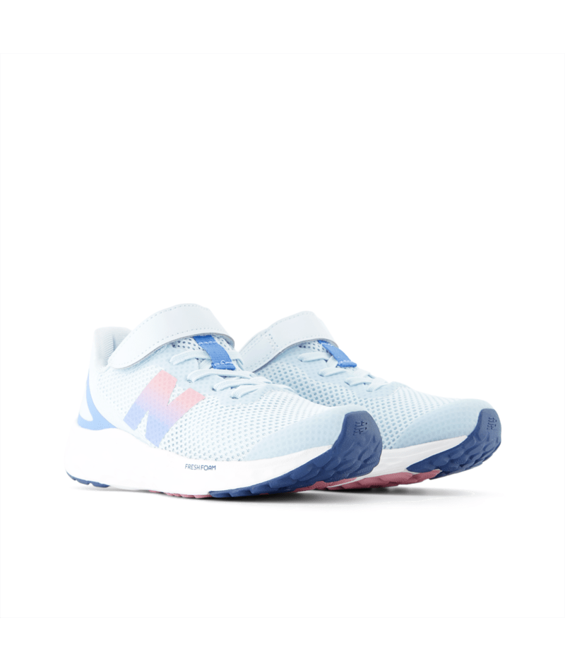 Pair of light blue running shoes with white soles on a white background