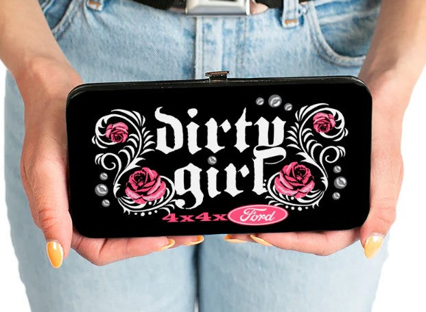 Black wallet with 'Dirty Girl' text and pink roses held by a person wearing light blue jeans.