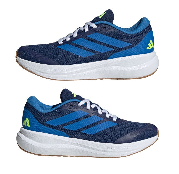 Blue and navy Adidas running shoes with white soles on a white background