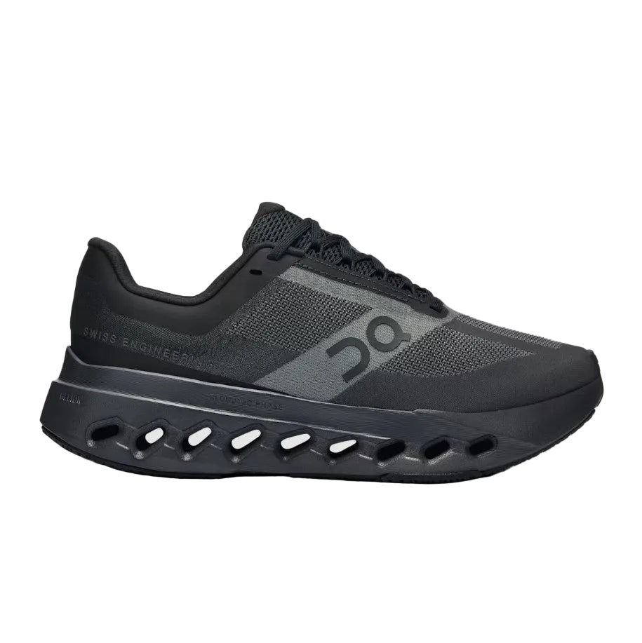 Black running shoe with visible brand name on a white background