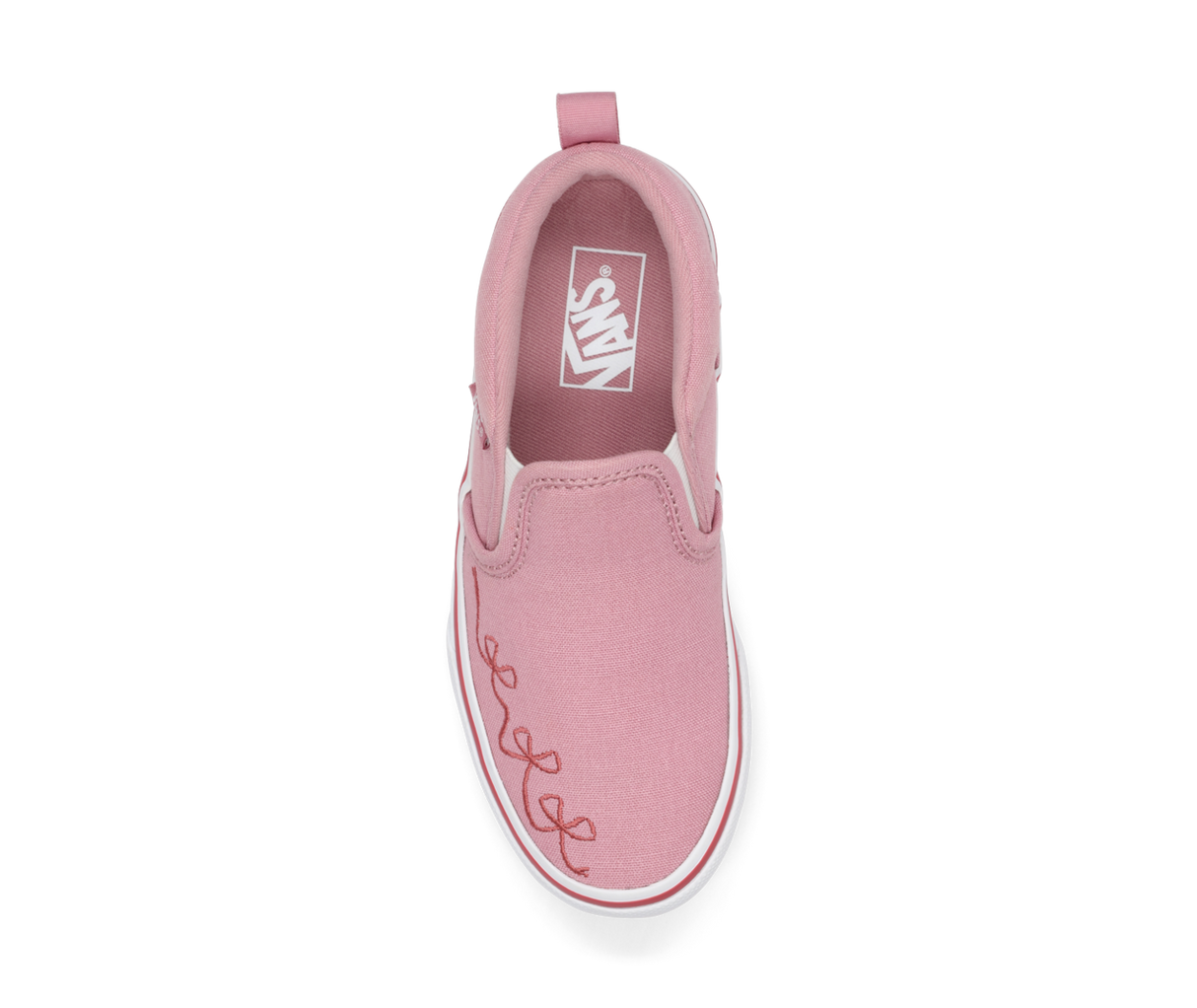 Pink slip-on Vans sneaker with an embroidered ribbon bow design on a white background