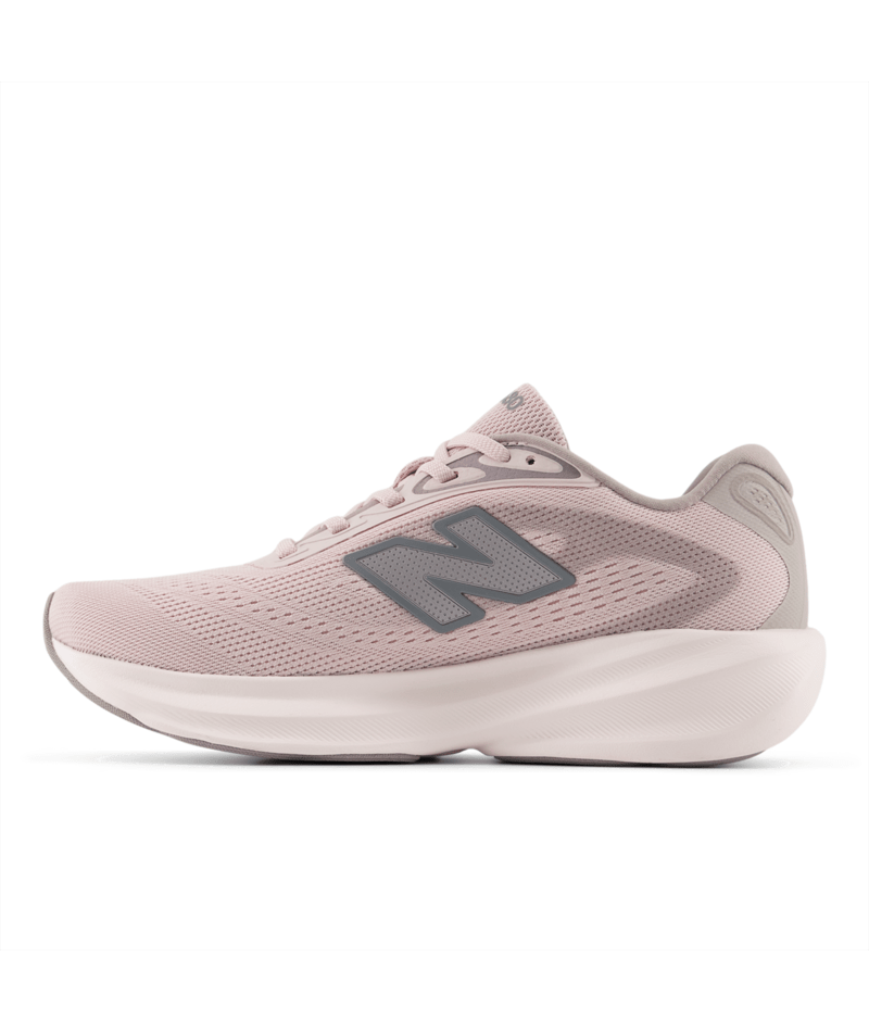 Pink running shoe with New Balance logo on a white background
