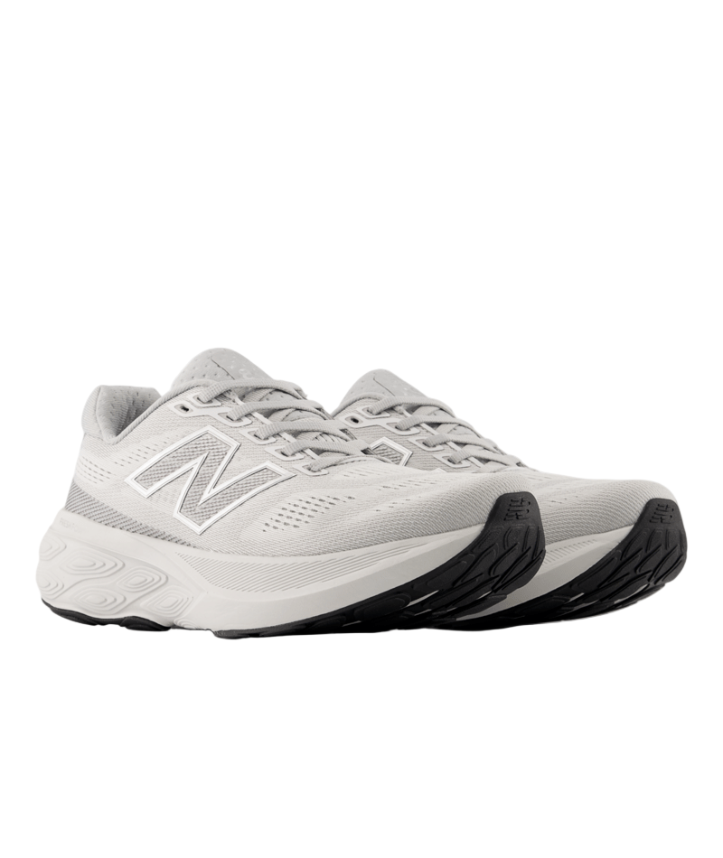 Gray running shoes with New Balance logo on a white background