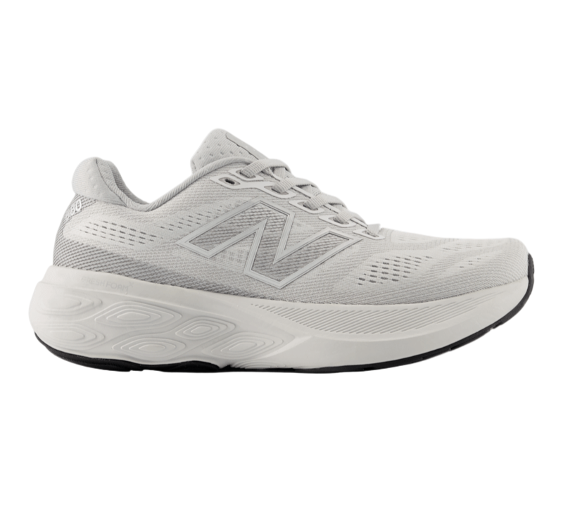 Gray running shoe with New Balance logo on a white background.  Can be purchased at www.sneakersplus.ca
