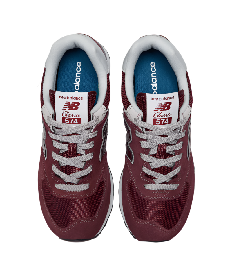 Maroon New Balance 574 sneakers with white laces on a white background