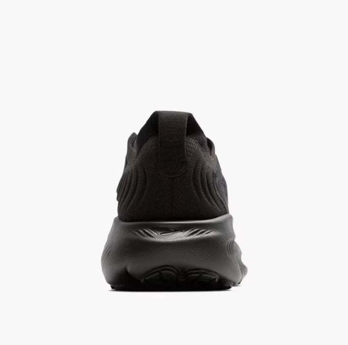 back view of a Black sneaker on a white background