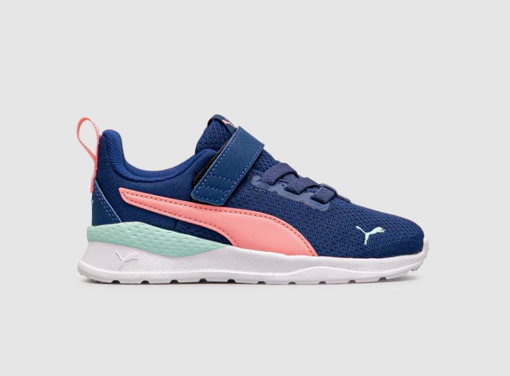 Blue and pink Puma sneaker on a light gray background