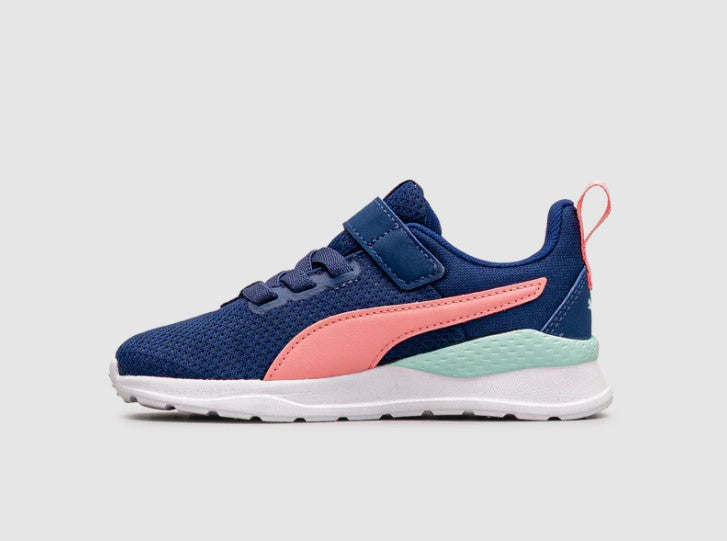 Blue and pink children's sneaker on a light gray background