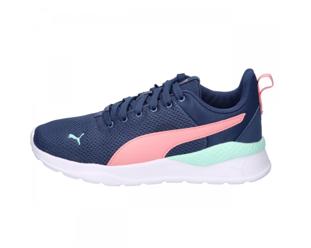 Navy blue Puma running shoe with pink and green accents on a white background
