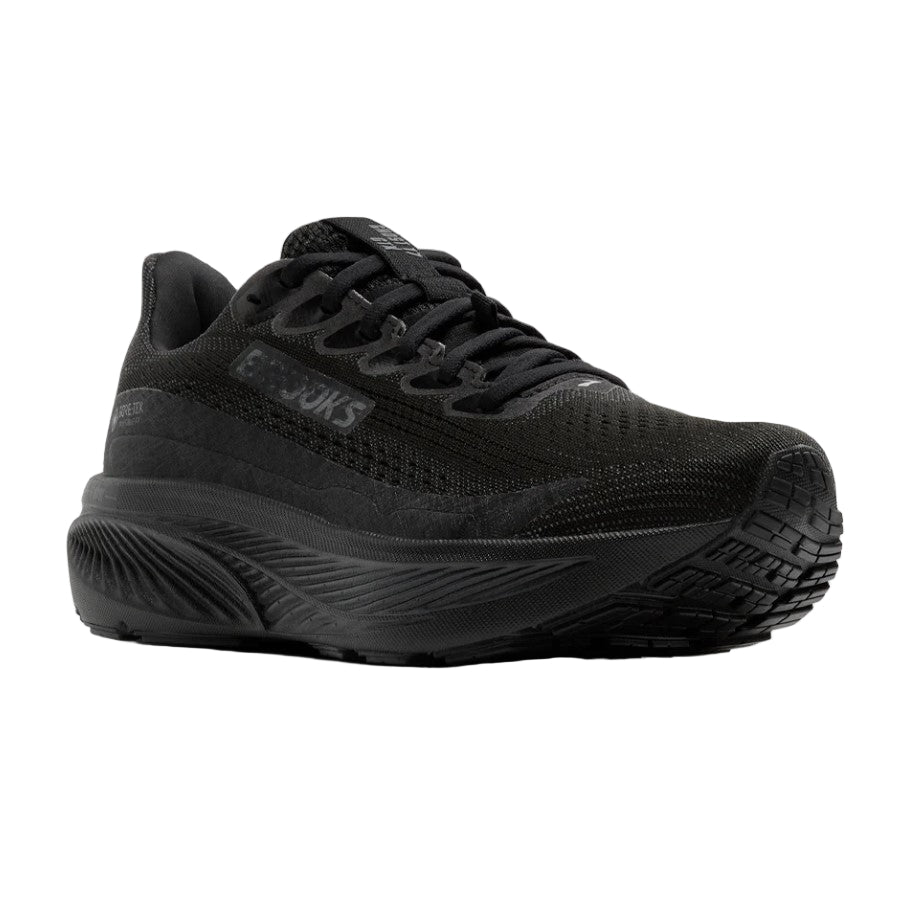 Black running shoe on a light gray background