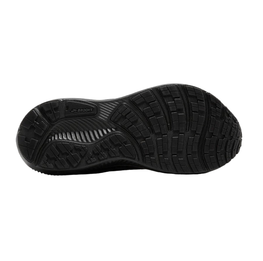 Black athletic shoe sole on a light gray background