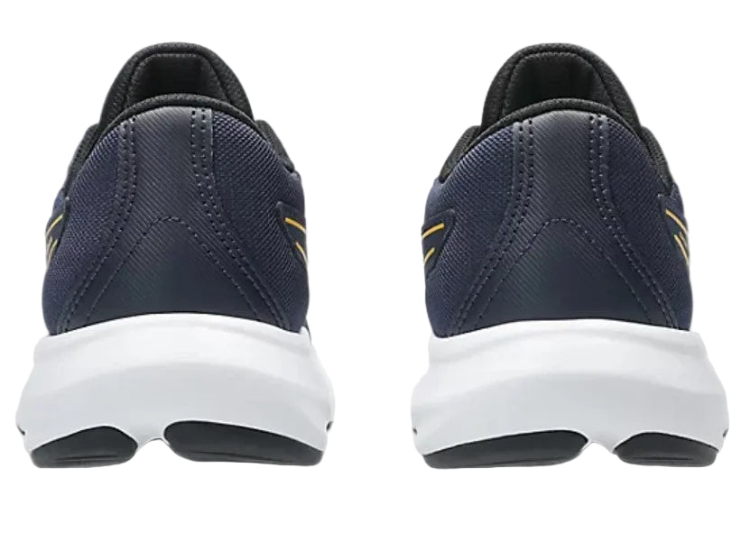 Navy running shoes with white soles on a light gray background