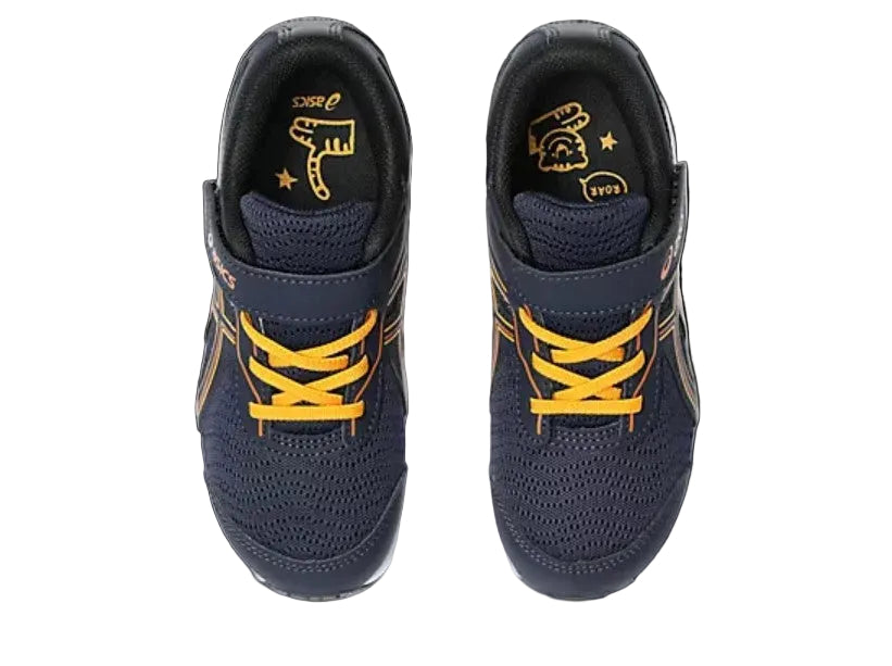 Navy and yellow running shoes on a white background