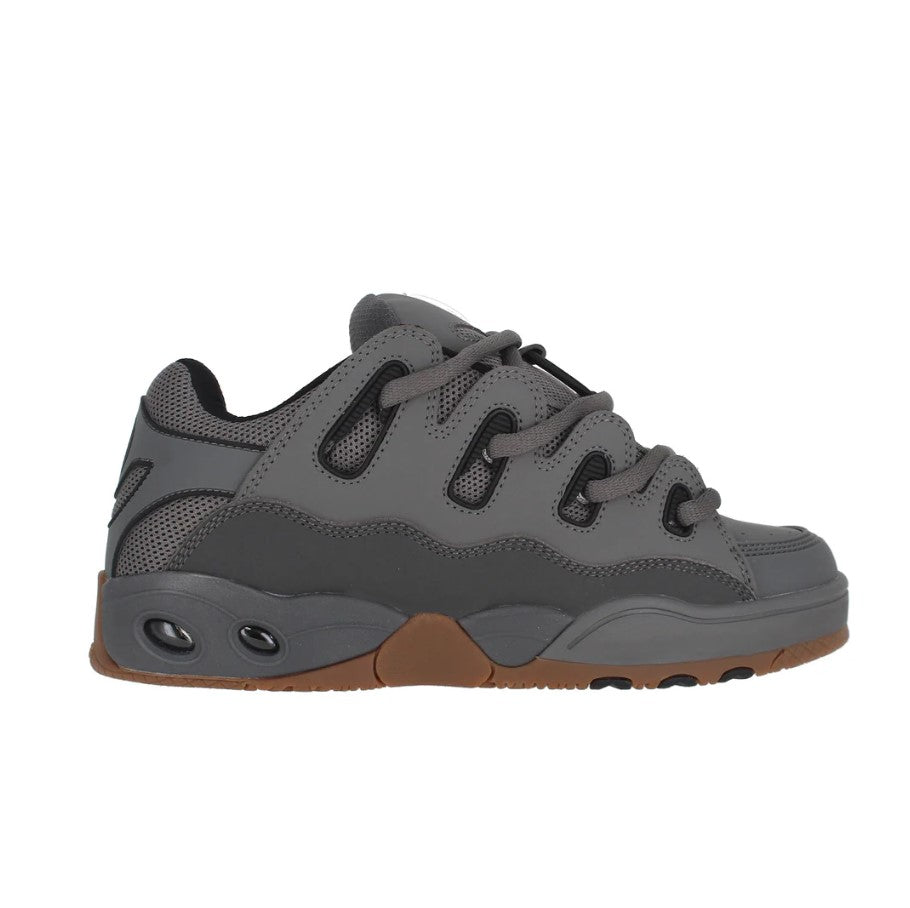 Gray sneaker with brown sole on a white background