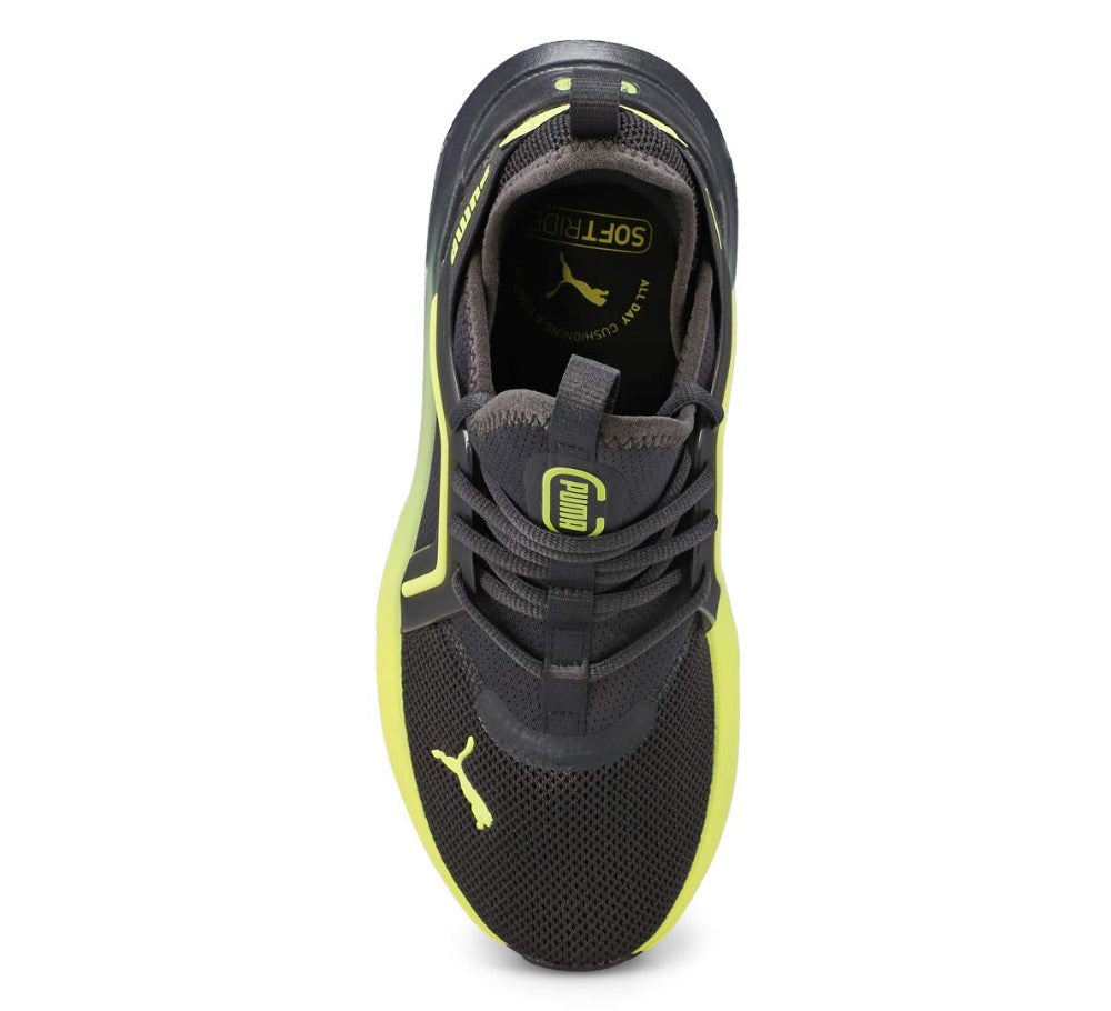 Black and yellow sneaker on a white background