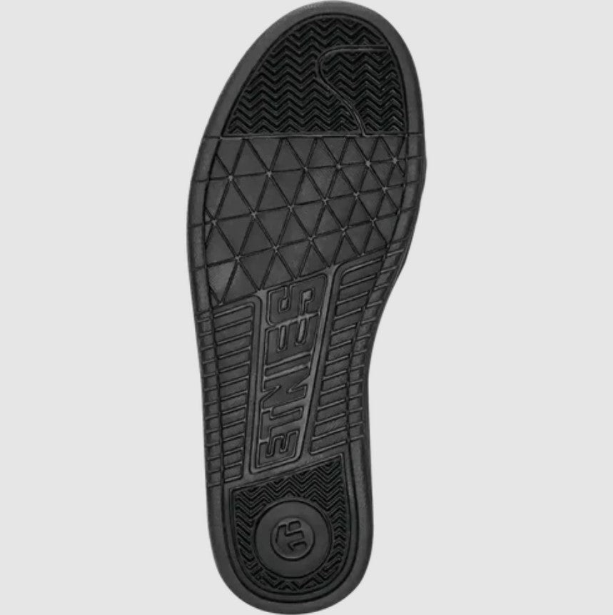 Black sole of a shoe with brand logo on a light gray background