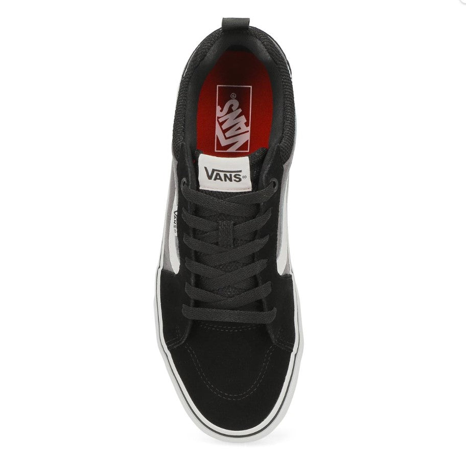 Black Vans sneaker on a white background from top view