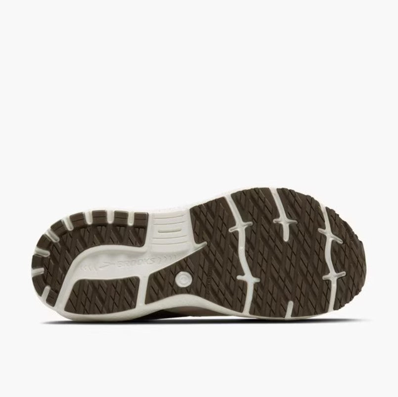 Close-up of a shoe sole with a white brand logo on a white background