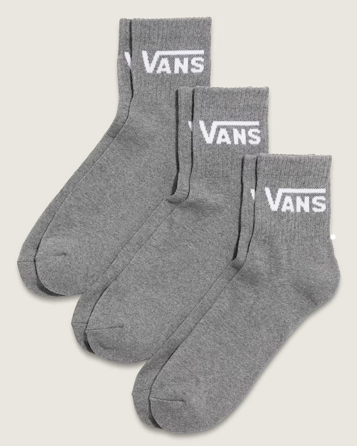 Three pairs of gray Vans socks on a light gray background