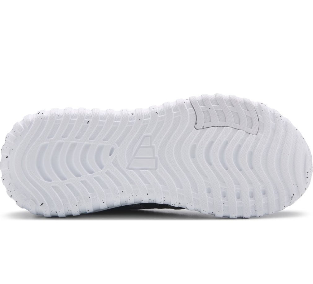 White sneaker sole with tread pattern on a white background
