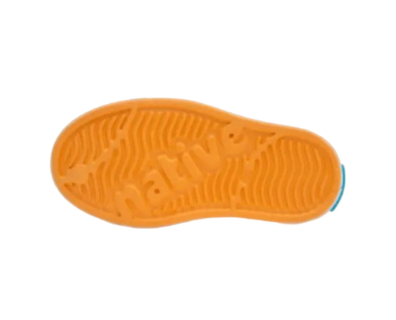 Orange slip-on shoe with an orange sole on a light gray background