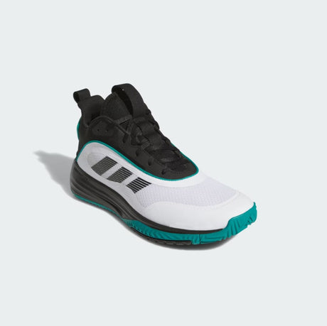 White and black sneaker with teal accents on a light gray background