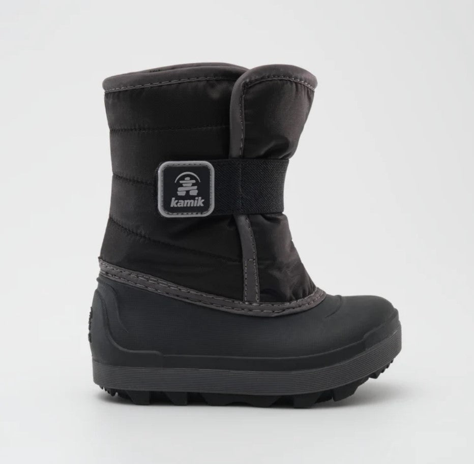 a black and grey kamik snow boot from the side with a black, rubber foot bed
