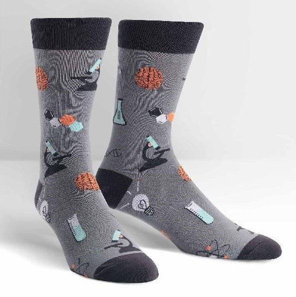Gray socks with science-themed designs on a white background