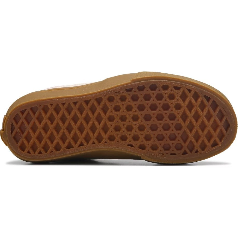Brown shoe sole with diamond pattern on a white background