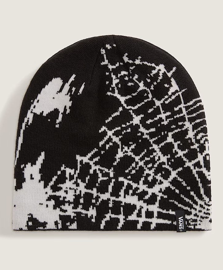 Black and white patterned beanie with Vans logo on a light gray background