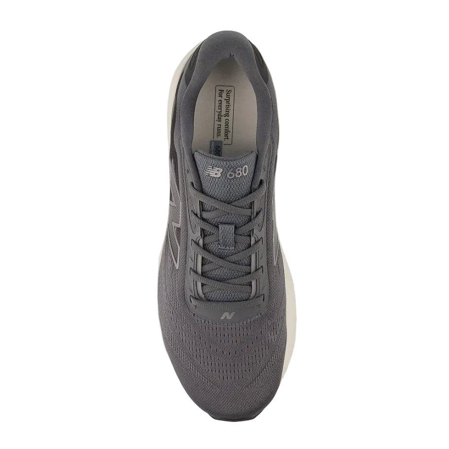 Gray sneaker with New Balance logo on a white background
