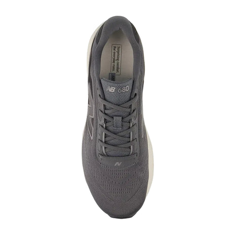Gray sneaker with New Balance logo on a white background