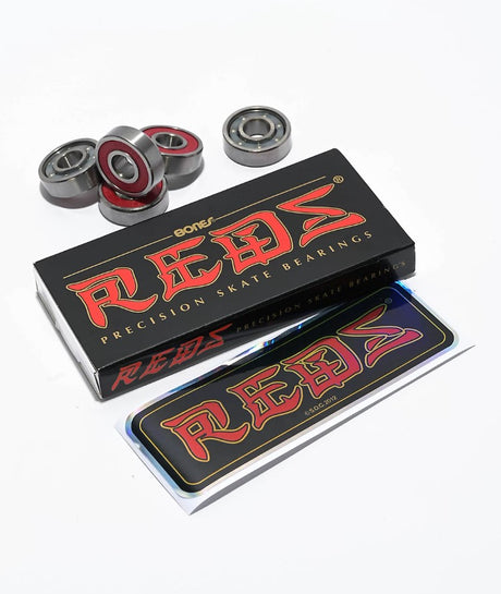 Box of Bones Precision Skate Bearings with bearings on a white background