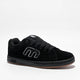 Black sneaker with white accents  on a white background