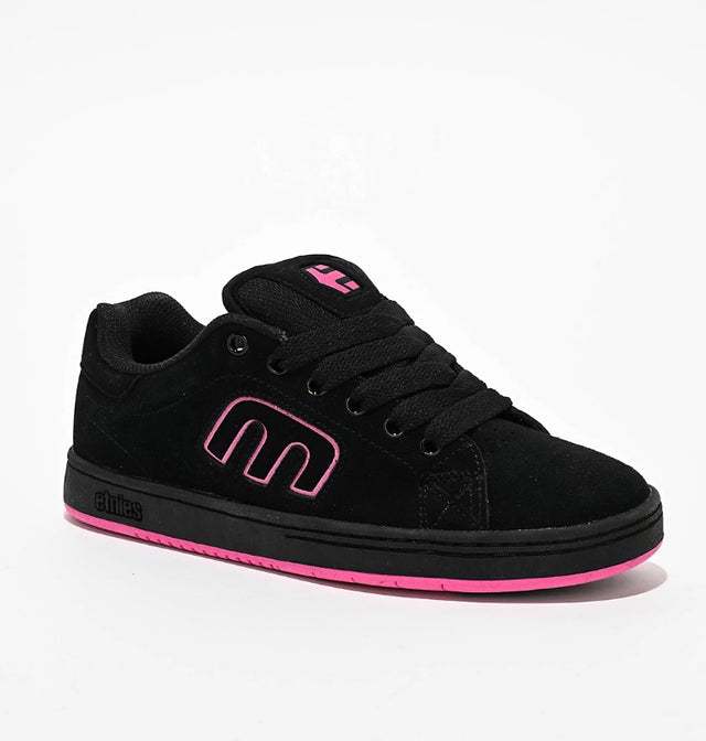 Black sneaker with pink accents on a white background