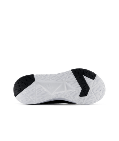 White athletic shoe with black sole on a white background