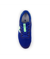 Blue running shoe with a green accent on a white background
