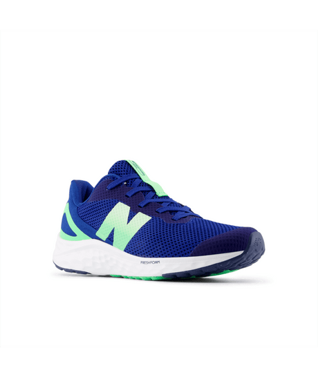 Blue running shoe with green accents on a white background
