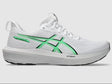 White running shoe with green accents on a light gray background