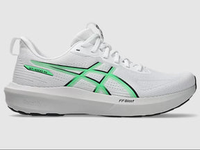 White running shoe with green accents on a light gray background