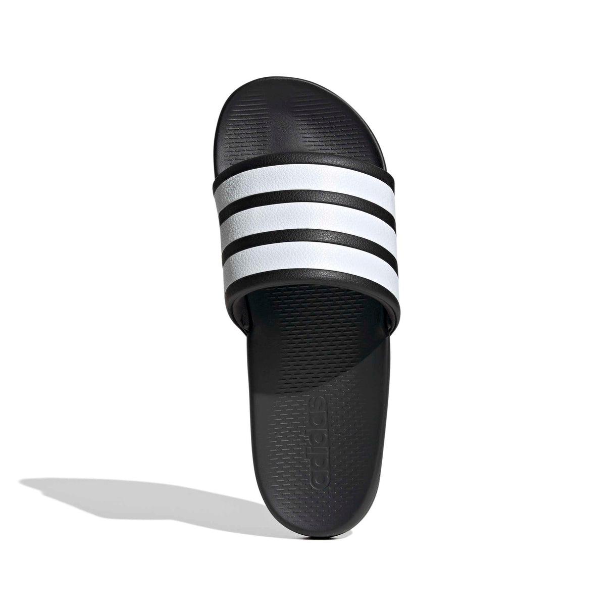 Black Adidas slide sandal with three white stripes on a white background