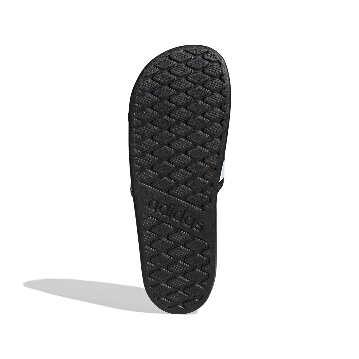 Black shoe sole on a light gray background