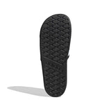 Black shoe sole on a light gray background