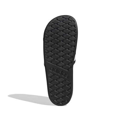 Black shoe sole on a light gray background